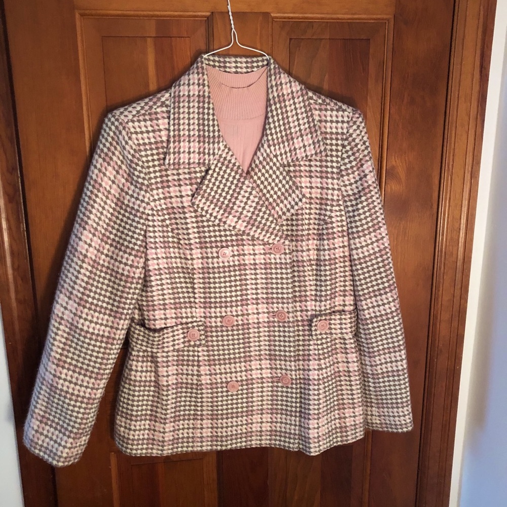Double breasted Blazer with sweater.